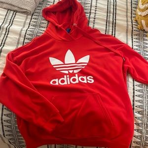 Red Adidas hoodie size large. Worn only a few times.